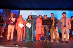 Performers singing the national anthem