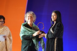 Lyndall Stein, Chair of the Board of Trustees of CARE International UK, presented the award to Sharmin Akter Ratna, Woman Shooter to win gold at South Asian Games