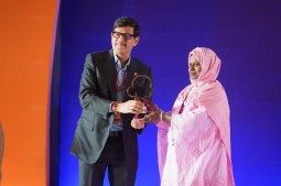 Our CD Ram Das handing over the award to Ferdousy Akter